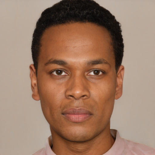 Neutral black young-adult male with short  black hair and brown eyes