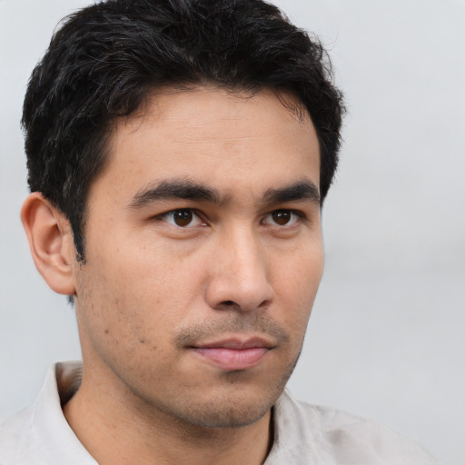 Neutral asian young-adult male with short  brown hair and brown eyes
