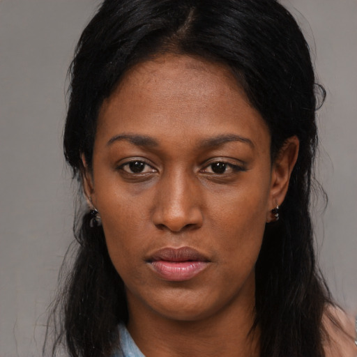 Neutral black young-adult female with long  black hair and brown eyes