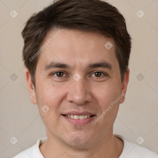 Joyful white adult male with short  brown hair and brown eyes