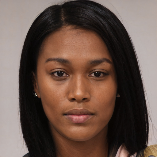 Neutral black young-adult female with long  black hair and brown eyes