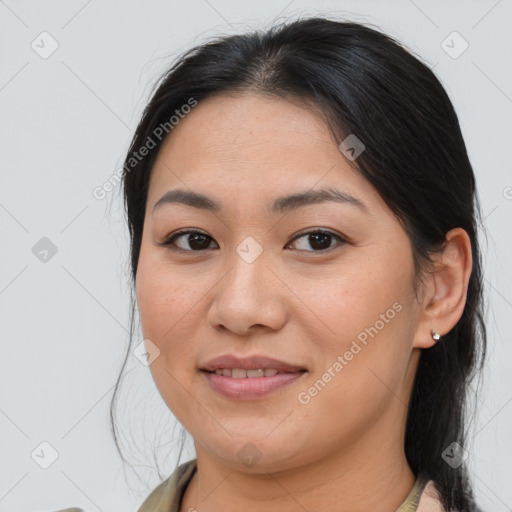 Joyful asian young-adult female with medium  brown hair and brown eyes