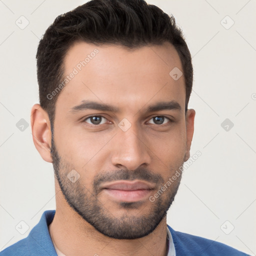 Joyful white young-adult male with short  brown hair and brown eyes