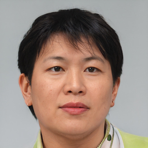 Neutral asian adult female with short  brown hair and brown eyes