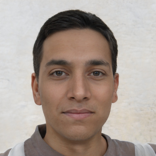Neutral white young-adult male with short  black hair and brown eyes