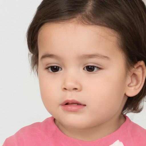 Neutral white child female with medium  brown hair and brown eyes