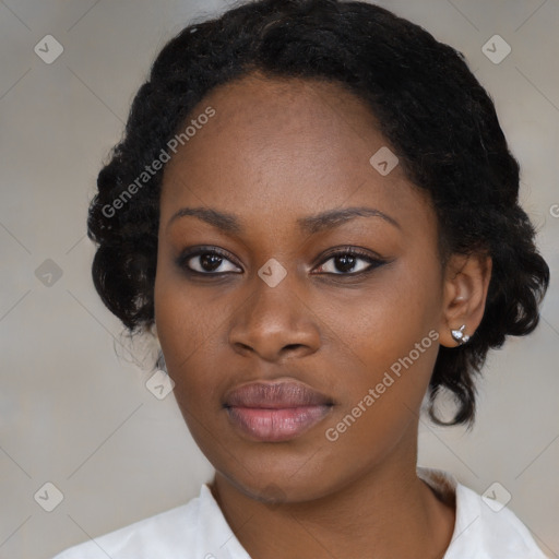 Joyful black young-adult female with medium  black hair and brown eyes