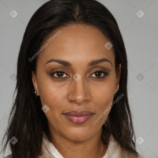 Joyful black young-adult female with long  brown hair and brown eyes