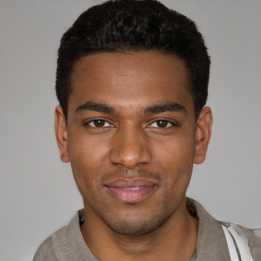 Neutral black young-adult male with short  brown hair and brown eyes