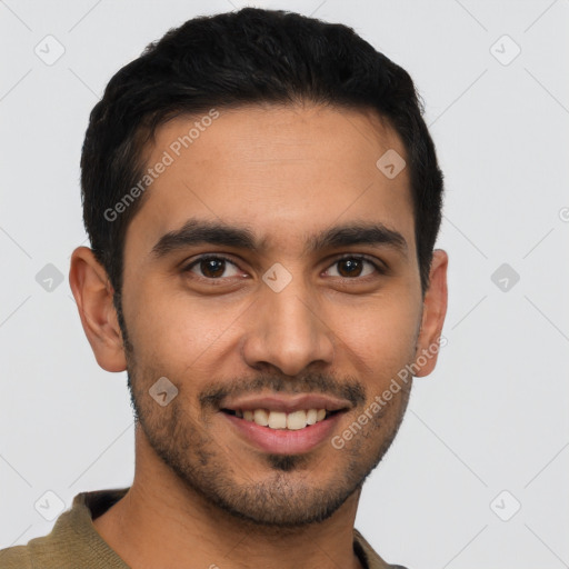 Joyful latino young-adult male with short  brown hair and brown eyes