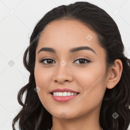 Joyful latino young-adult female with long  black hair and brown eyes