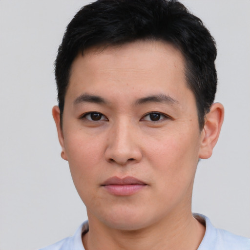 Neutral asian young-adult male with short  black hair and brown eyes
