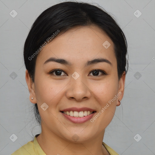 Joyful asian young-adult female with short  brown hair and brown eyes