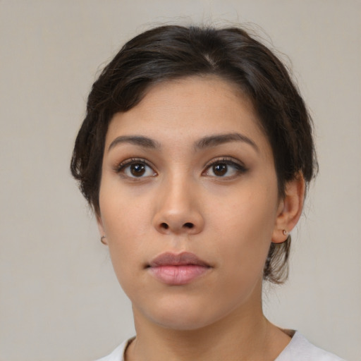 Neutral asian young-adult female with medium  brown hair and brown eyes