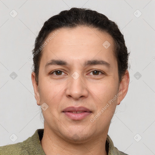 Joyful white adult male with short  brown hair and brown eyes