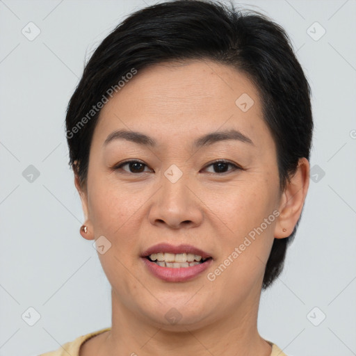 Joyful asian young-adult female with short  brown hair and brown eyes