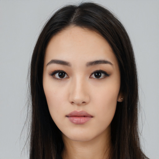 Neutral asian young-adult female with long  black hair and brown eyes