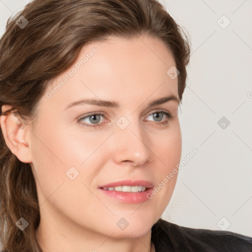 Joyful white young-adult female with medium  brown hair and blue eyes