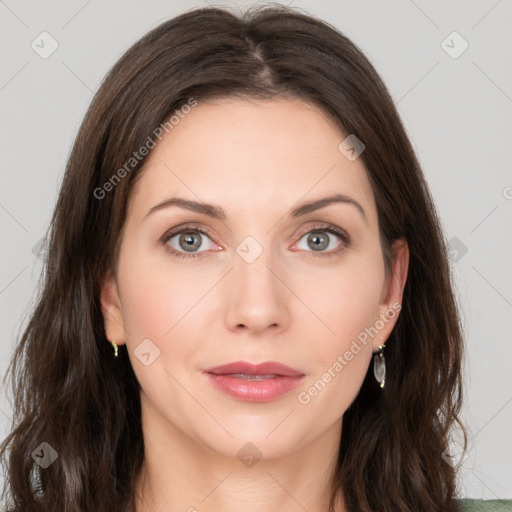 Joyful white young-adult female with long  brown hair and green eyes