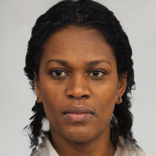 Neutral black young-adult female with short  black hair and brown eyes