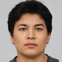 Neutral asian young-adult male with short  brown hair and brown eyes