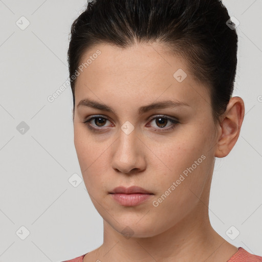 Neutral white young-adult female with short  brown hair and brown eyes