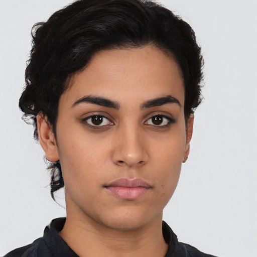 Neutral latino young-adult female with short  brown hair and brown eyes