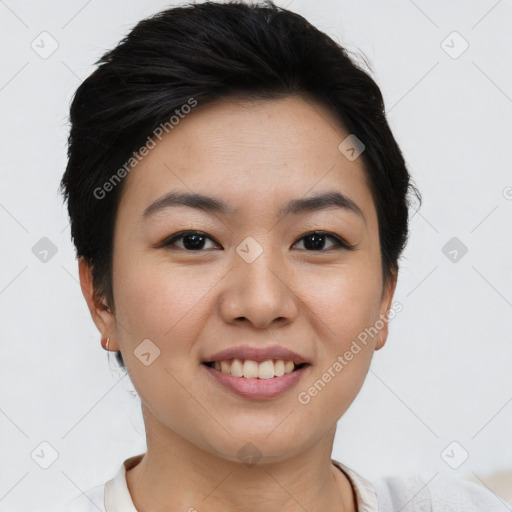 Joyful asian young-adult female with short  brown hair and brown eyes