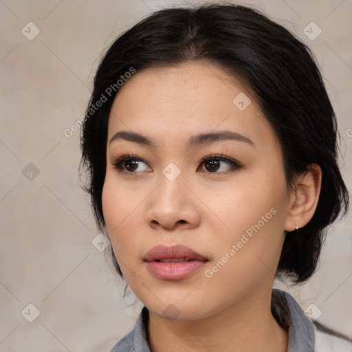 Neutral asian young-adult female with medium  black hair and brown eyes