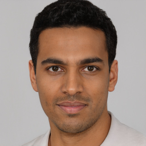 Neutral latino young-adult male with short  black hair and brown eyes
