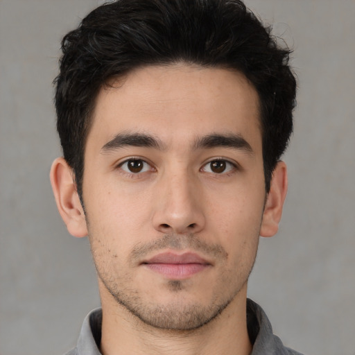 Neutral asian young-adult male with short  brown hair and brown eyes