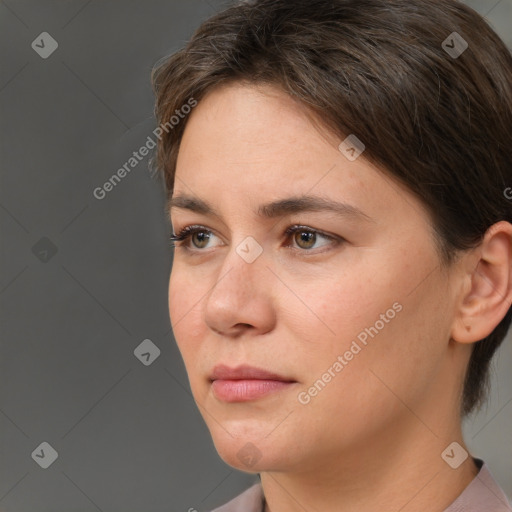 Neutral white young-adult female with short  brown hair and brown eyes