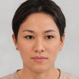 Neutral asian young-adult female with short  brown hair and brown eyes