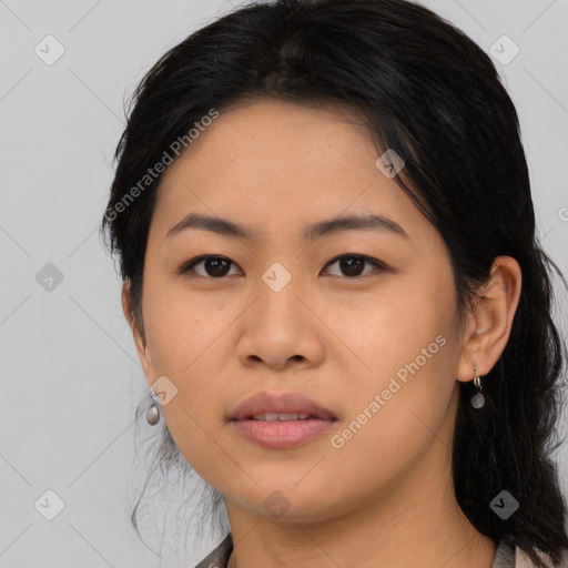 Joyful asian young-adult female with medium  black hair and brown eyes