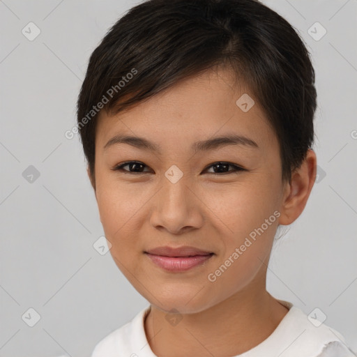 Joyful asian young-adult female with short  brown hair and brown eyes