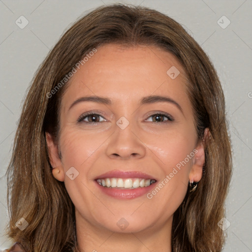 Joyful white young-adult female with long  brown hair and brown eyes