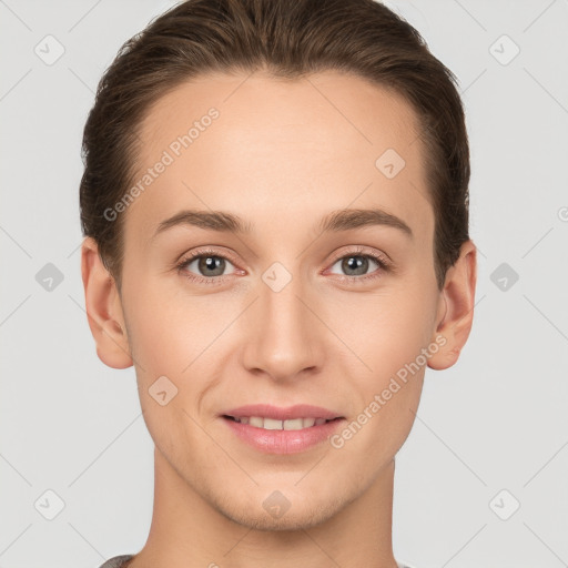 Joyful white young-adult female with short  brown hair and grey eyes