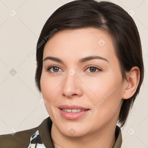 Joyful white young-adult female with medium  brown hair and brown eyes