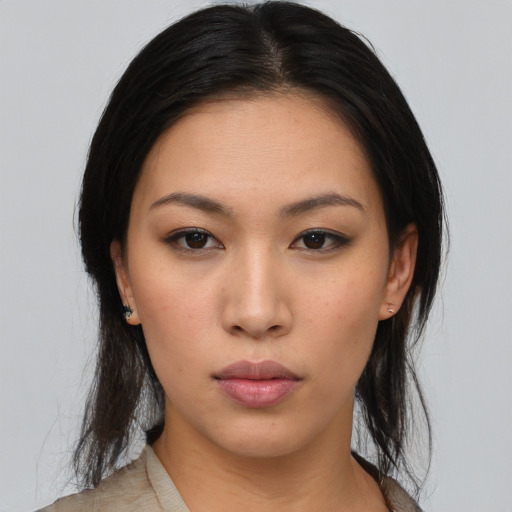 Neutral asian young-adult female with medium  brown hair and brown eyes