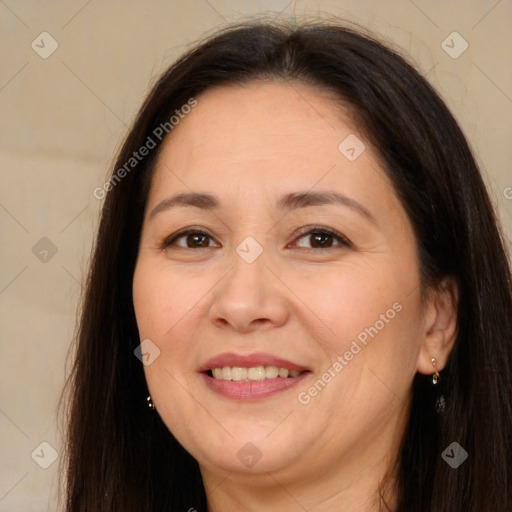 Joyful white adult female with long  brown hair and brown eyes