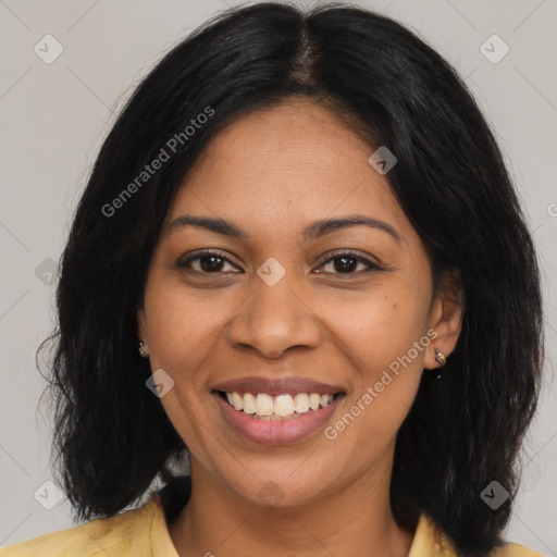 Joyful latino young-adult female with medium  brown hair and brown eyes