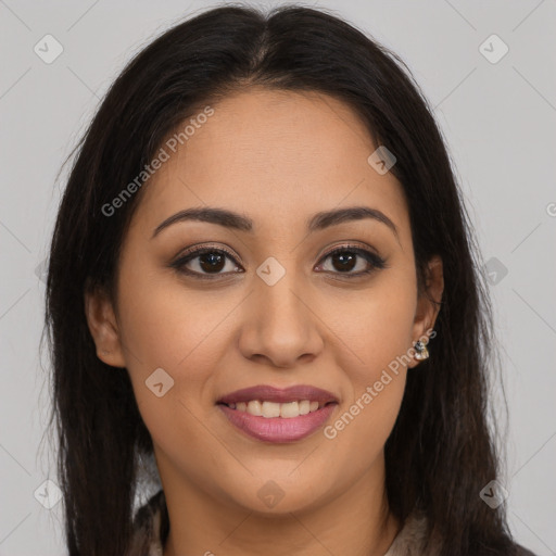 Joyful latino young-adult female with long  brown hair and brown eyes