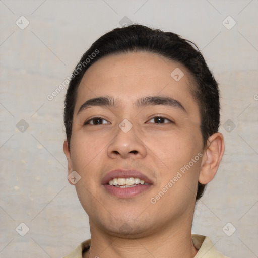 Joyful white young-adult male with short  black hair and brown eyes