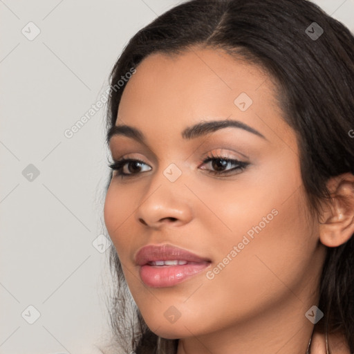 Joyful latino young-adult female with long  brown hair and brown eyes