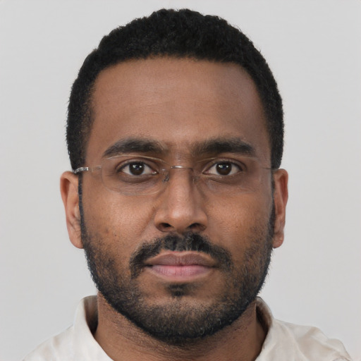 Neutral black young-adult male with short  black hair and brown eyes