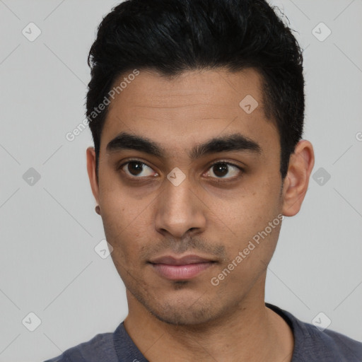 Neutral latino young-adult male with short  black hair and brown eyes