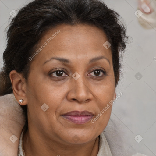 Joyful latino adult female with short  brown hair and brown eyes