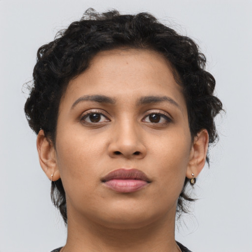 Neutral latino young-adult female with short  brown hair and brown eyes