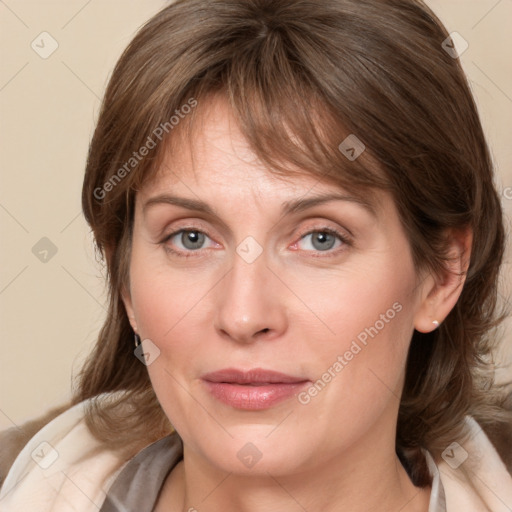 Joyful white young-adult female with medium  brown hair and blue eyes