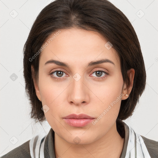 Neutral white young-adult female with medium  brown hair and brown eyes